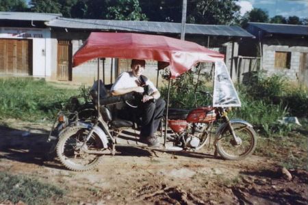 The Mototaxi- bizarre cross between an antique car and a motorcycle. 
Fun but dangerous. Jan. 2000
Michael J. Goble
23 Jan 2002