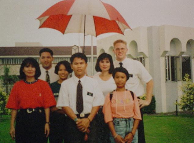 Elder K. Wilson, Rodrigez, and Lapa with investigators at the Manila Temple.  It rained a little that day.
Kevin A. Wilson
26 Jul 2003