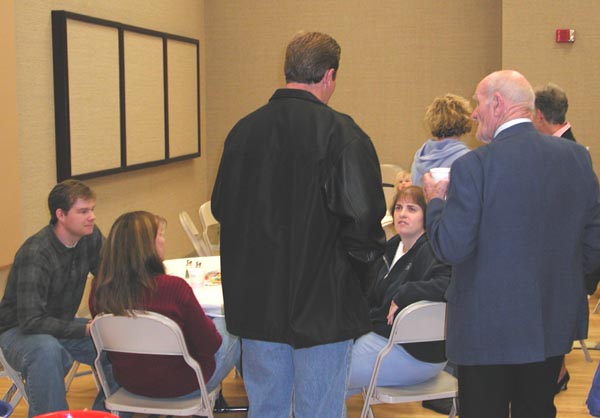 Elder Smith, his wife, Elder Andrus, Sister Callor, Holly Andrus, Elder Clark, and Sister Nelson
Bryan Moody
07 Apr 2003