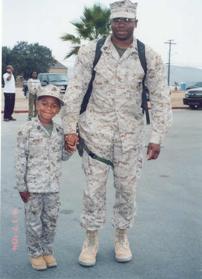 Like father, Like son ... Ryan Jr is just too happy and relieved his Dad's home again from another deployment to Iraq.
Sonia Siniua James
11 May 2005