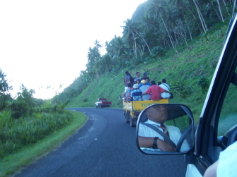 People pack truck beds to catch a ride as few have cars or trucks as seen through the ZL's window.
Tyler McKay Sannar
17 Aug 2006