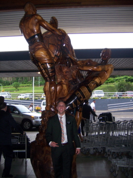 Elder Sannar inthe airport in front of a wood sclpture 4-06
Tyler McKay Sannar
17 Aug 2006