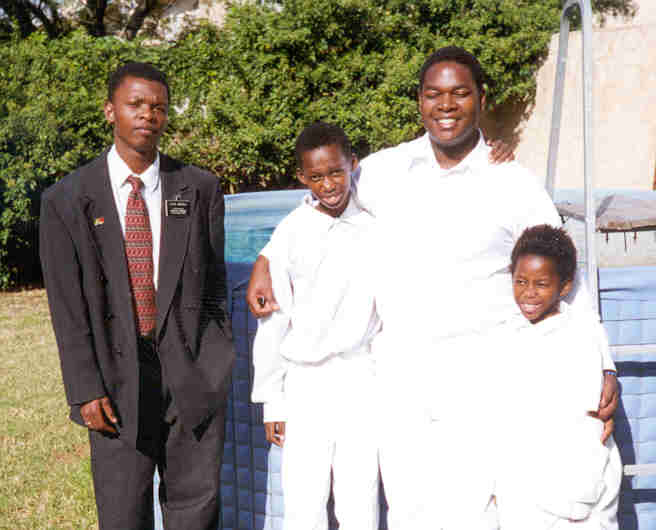Elder Mashila and Elder Johnson with 
Nzuluwasi, and Njinglawasi--Umtata
Rodric Anthony Johnson
12 Feb 2002