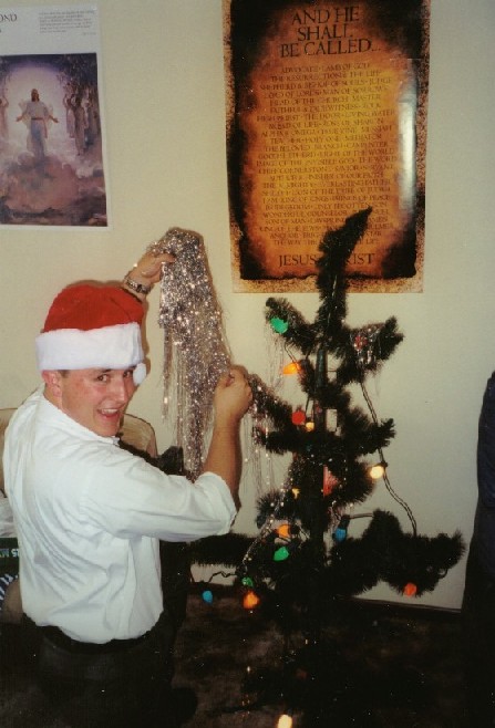 Elder Josh Madsen decorate the Charlie Brown's reject Christmas tree in Groves, TX 2001
Joshua David Madsen
10 Feb 2002