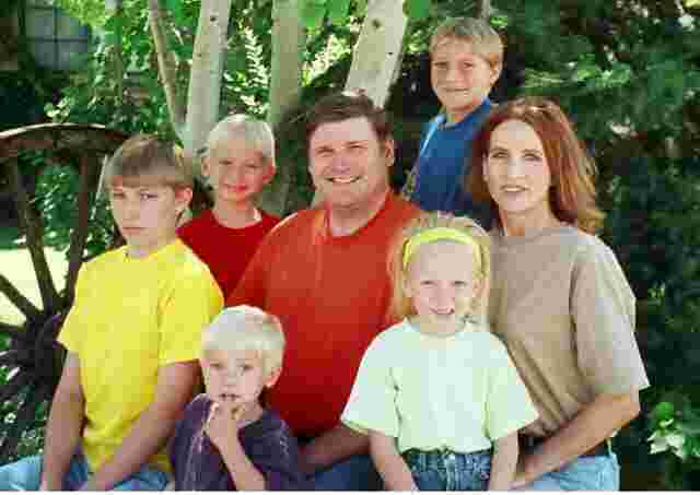 This is my adorable family!  My husband, Bryan; my step-sons, Joseph (in yellow) & Michael (in back) (Nelson); and children, Sterling(in red), Ashley(in green), and Walker(in purple) (Black).  Yes, my hair is now red!  Have you ever seen 'Legally Blonde'?  Needless to say, I would like a little more respect as an attorney.  However, that movie is my inspiration!!! Quite a houseful!  But, usually a party-a-minute around here!
Janet  Nelson
05 Apr 2003
