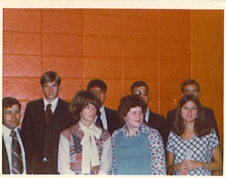 Front Row L to R:  Sisters Mary Burkman & Terry Ward.
Sister Burkman  and I was from the same small ward here in California.  Elder Tim Anderson also from our ward served in the Washington DC Mission from '77 - '79
I don't know who any of the others are.
Michael Kim Wilson
18 May 2004