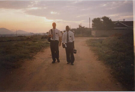 Me [Elder Brogan] and Elder Mashai on our way. I wish the photo could show just how beautiful the sunsets are.
Sebastian Giles Brogan
04 Jan 2005